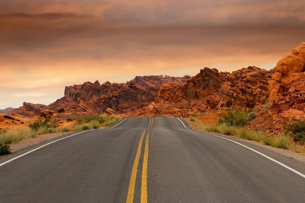 road, sandstone, sunset, pavement, dusk, red rocks, rock formations, rocks, desert, landscape, nature, arid, outdoors, scenic, utah, nevada, usa