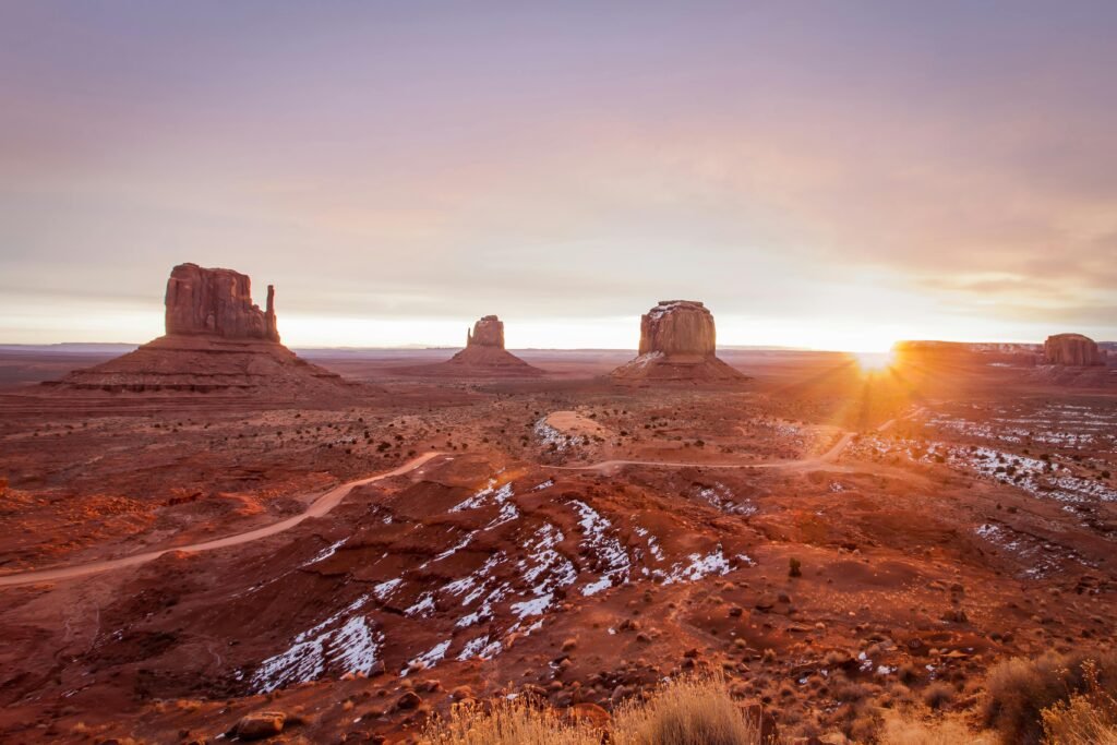 Stunning sunrise landscape of Monument Valley buttes and mesas in Arizona.